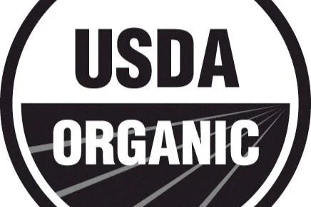 USDA Organic logo badge with black and white design and stylized field lines