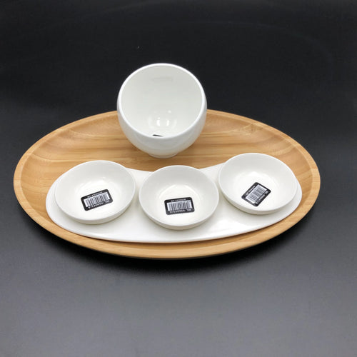 White porcelain bowls and cups on a wooden tray, Qu!rk Boutique serveware set