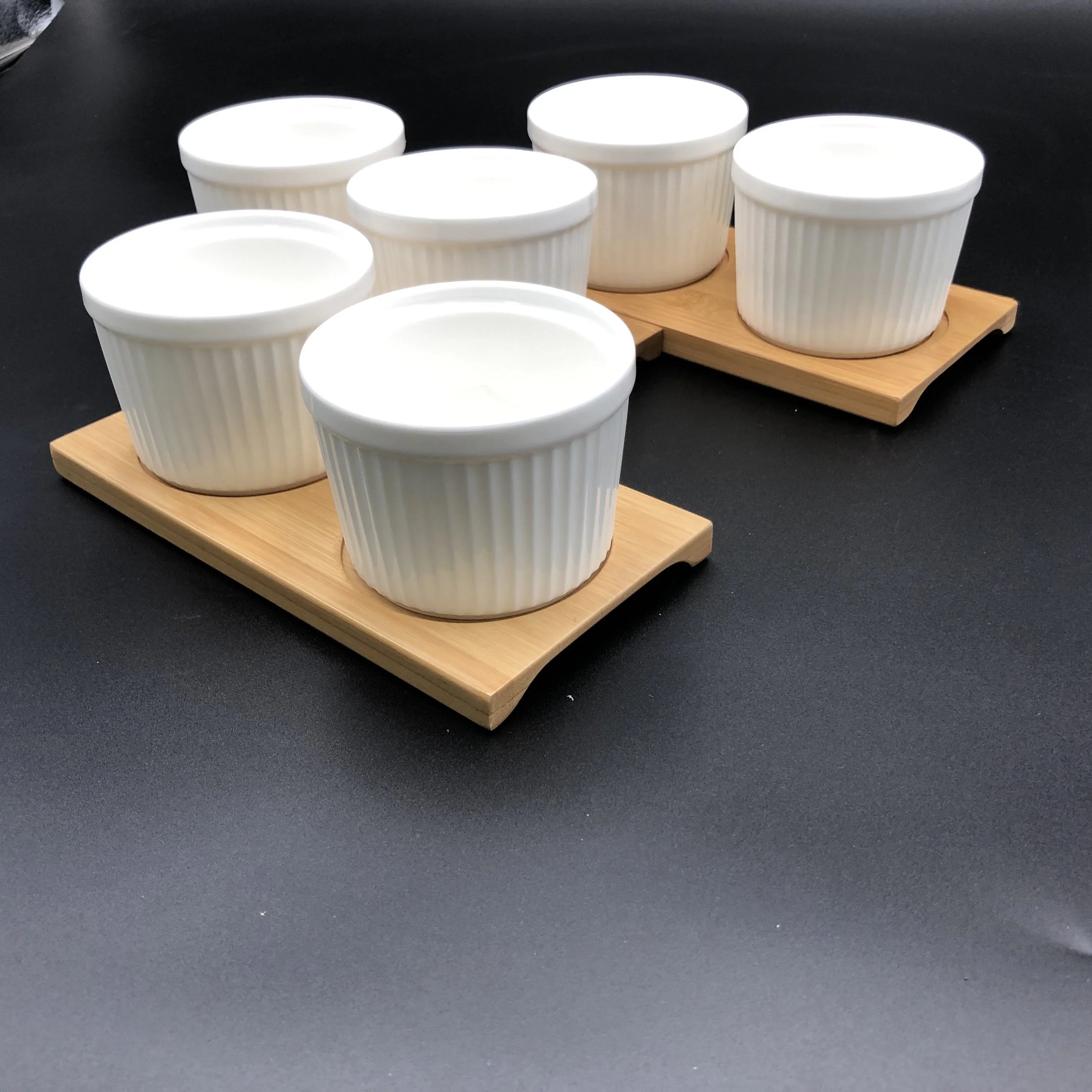 Set of six white ceramic ramekins with lids on bamboo trays, Qu!rk Boutique giftware