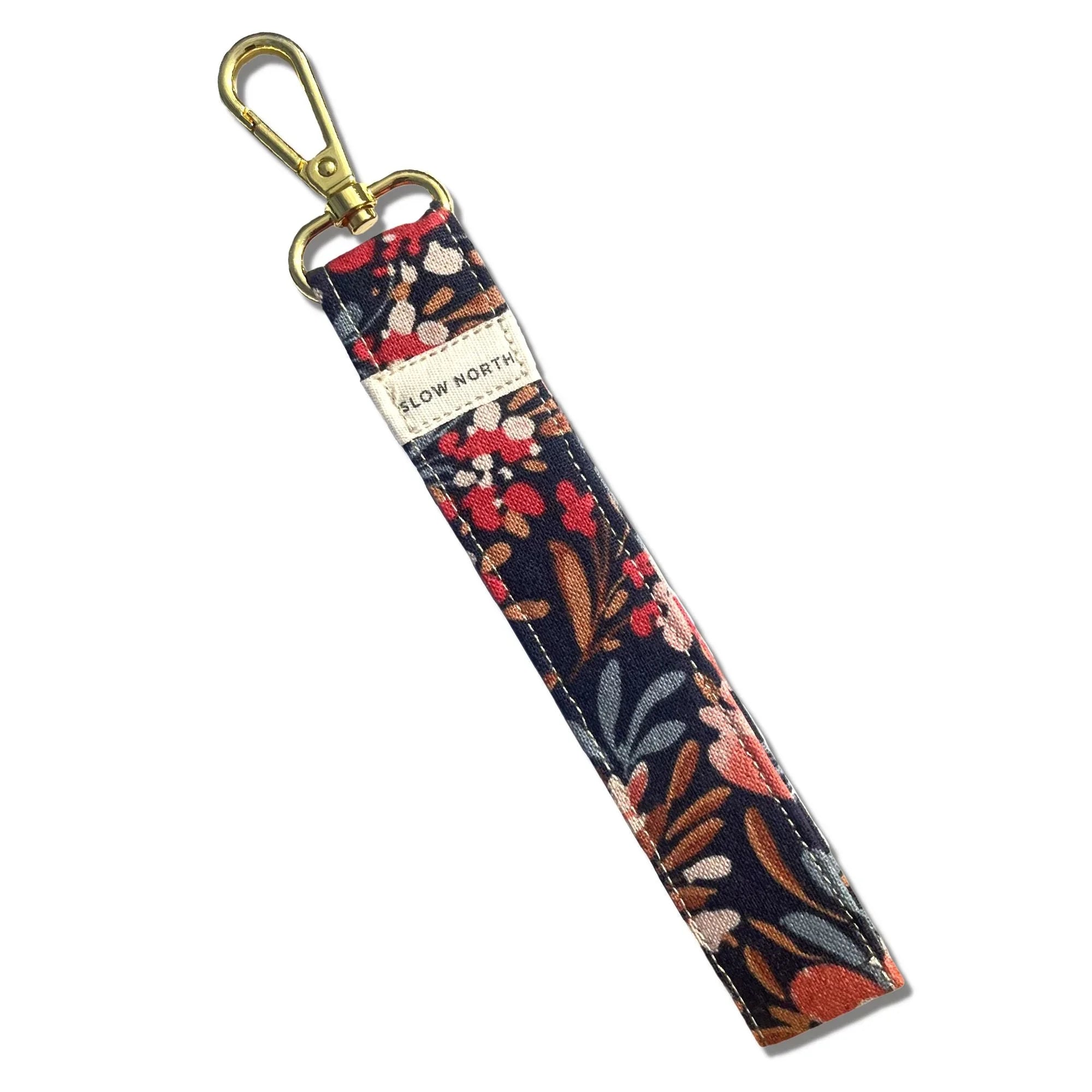 Floral fabric wristlet keychain with gold clasp, eco-friendly gift from Qu!rk Boutique