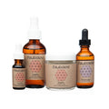 Set of PAAVANI Kapha skincare products with glass bottles and jars, natural cosmetics at Qu!rk Boutique