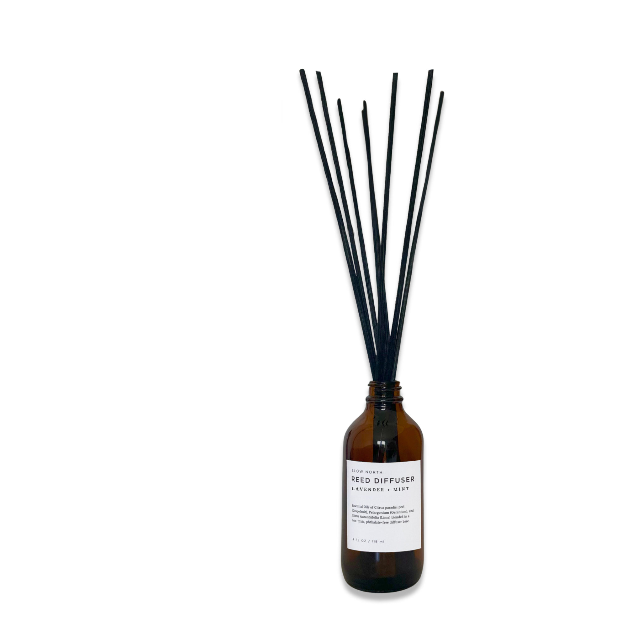 Amber glass bottle reed diffuser with black reeds labeled lavender and mint scent
