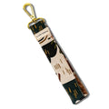 Fabric wristlet keychain with abstract pattern and gold clip, labeled Slow North