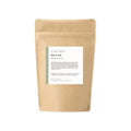Slow North Revive bath salts bag with minimalist label, featured at Qu!rk Boutique