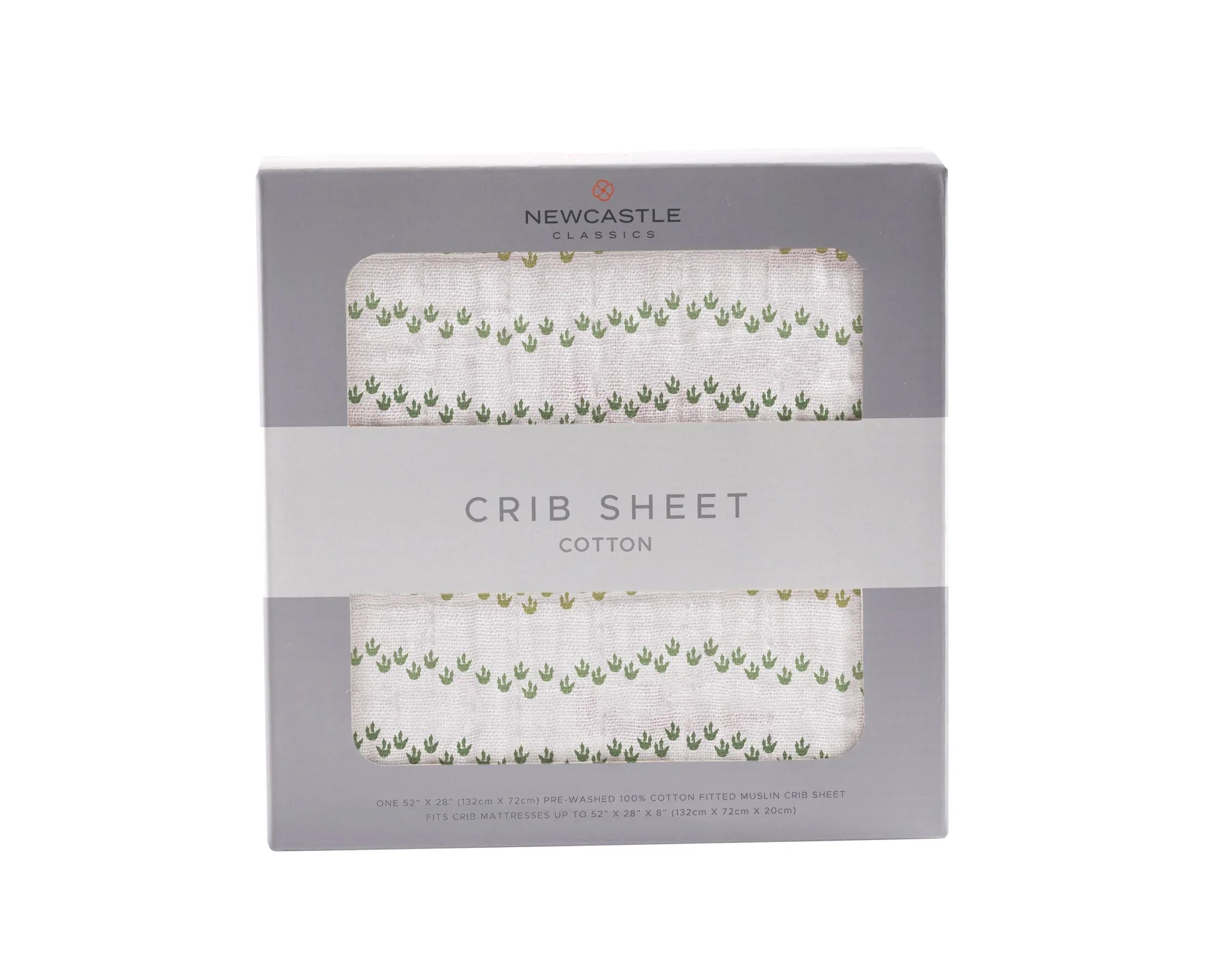 Newcastle Classics cotton crib sheet with green plant pattern, boxed for gift shop display
