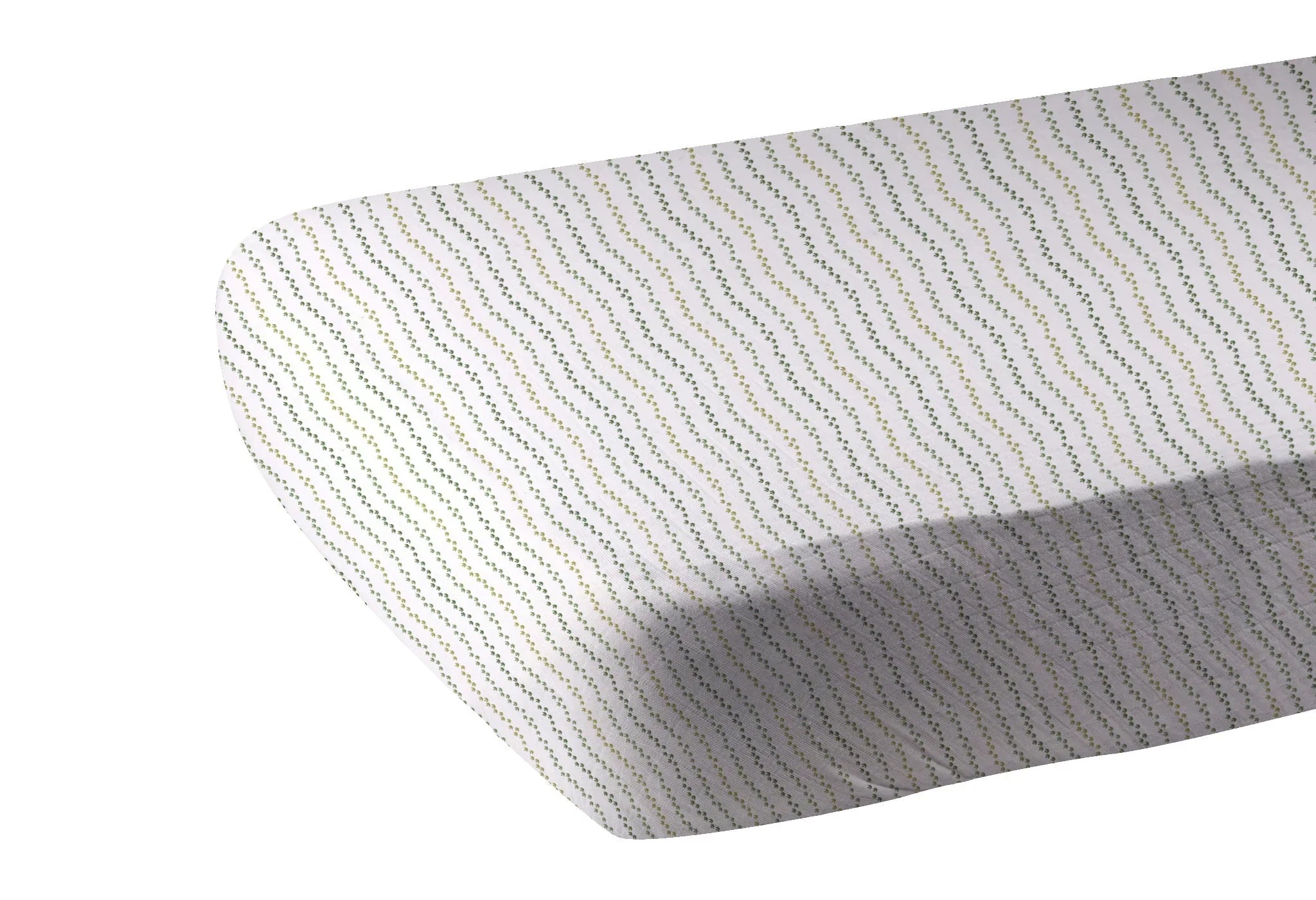 White fitted sheet with wavy green dotted lines, artist-designed, sustainable gift.