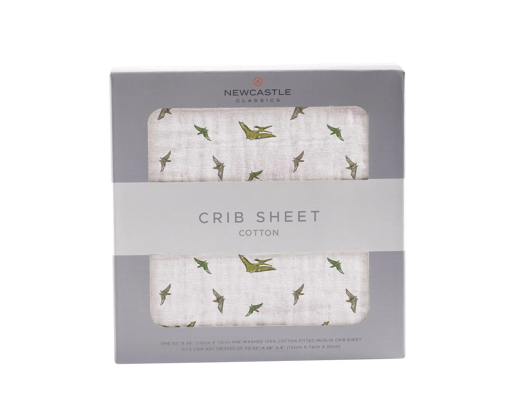 Newcastle Classics cotton crib sheet in gift box, featuring green dinosaur print