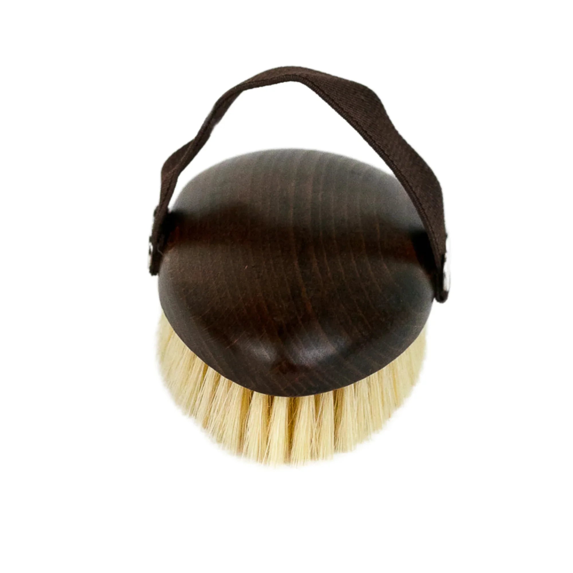 Round wooden dry body brush with light bristles and dark fabric strap handle