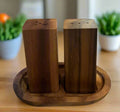 Wooden salt and pepper shakers set on tray, modern kitchen decor at Qu!rk Boutique