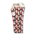 Slow North neck wrap with floral geometric pattern and cream woven handles