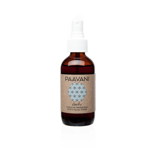PAAVANI Clarify facial toner spray bottle for acne-prone skin against white background