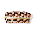 Floral fabric travel pouch with geometric pattern and gold zipper by Slow North