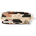 Rectangular fabric travel pouch with abstract earthy pattern and gold zipper by Slow North