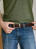 Sustainable brown cork belt with silver buckle on blue jeans, Qu!rk Boutique eco fashion