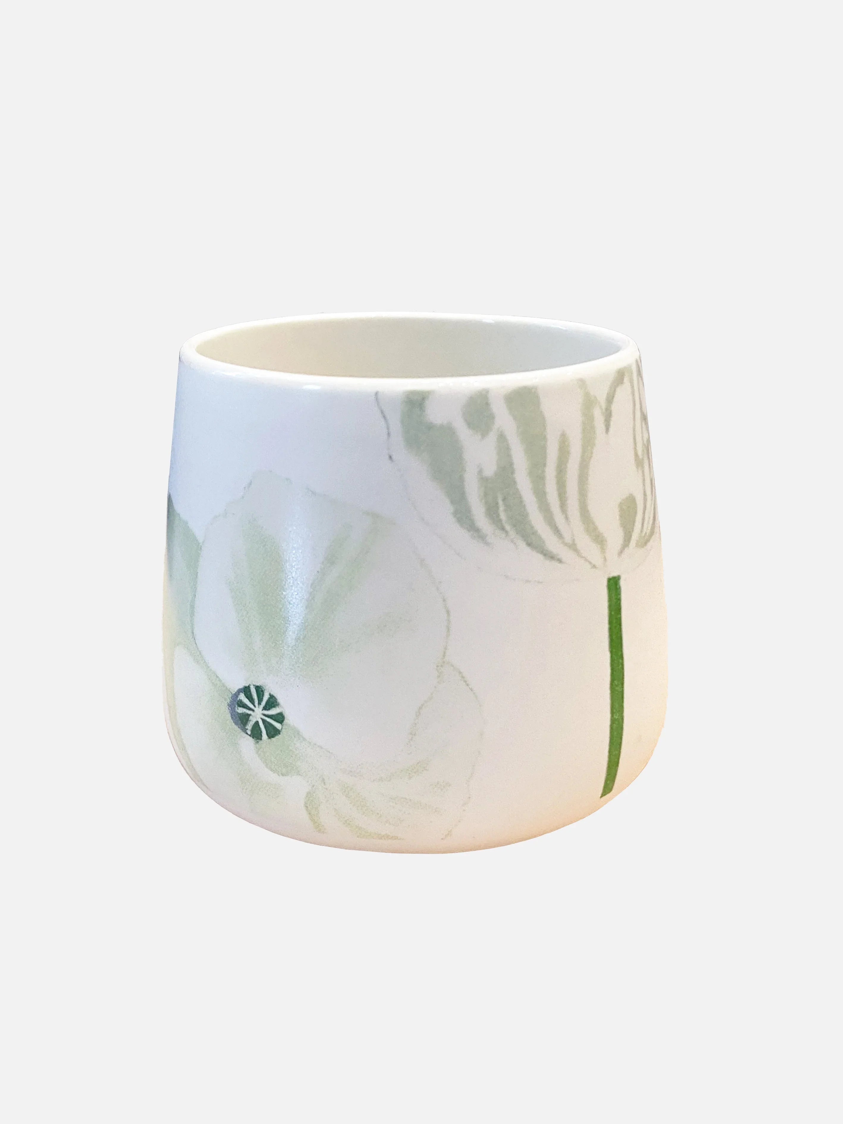 White ceramic mug with delicate pale green and white poppy floral design
