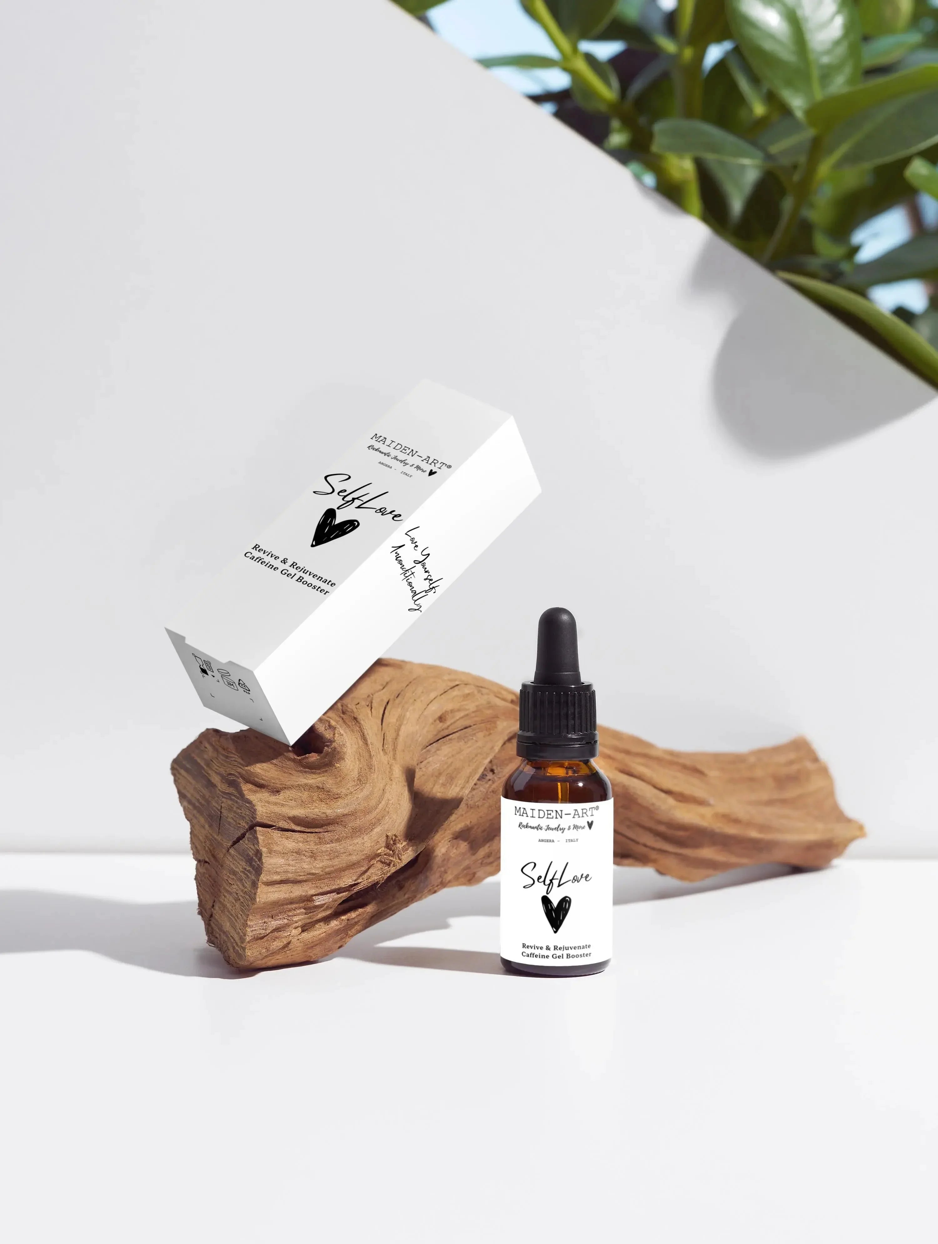 Self Love caffeine oil booster with dropper and box on wood, bright minimalist background, Qu!rk Boutique