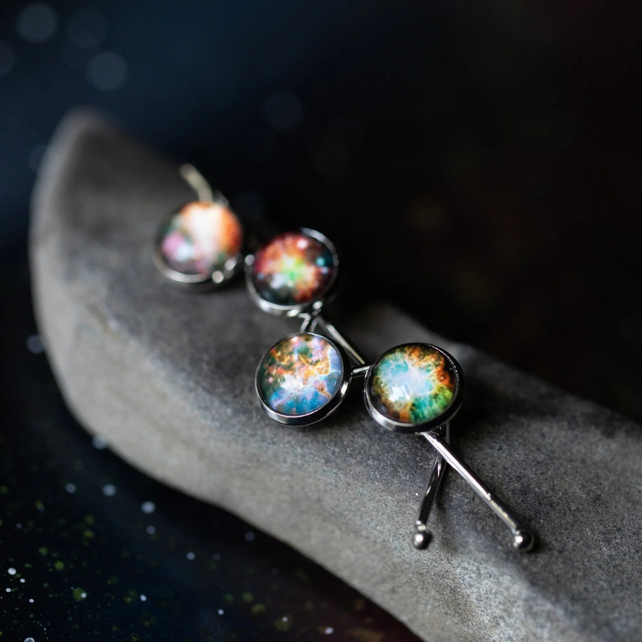 Cosmic galaxy hairpins with colorful nebula designs on stone, Qu!rk Boutique jewelry