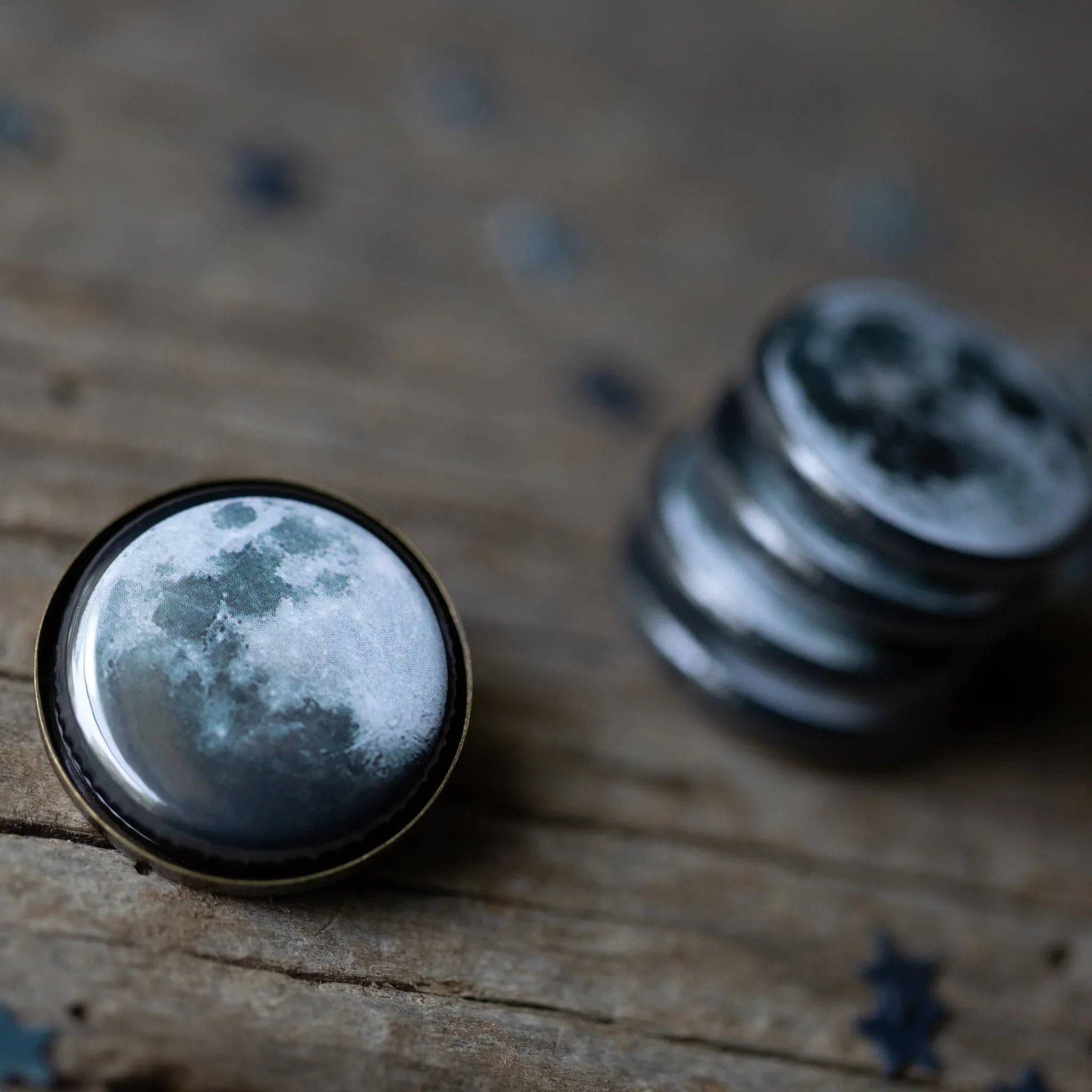 Cosmic moon art glass cabochon accessory on rustic wood, Qu!rk Boutique gift shop style