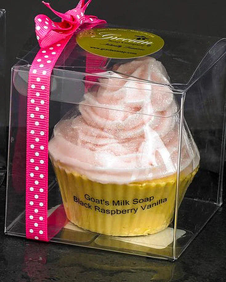 Goat's milk soap shaped like cupcake with pink cream on top in clear gift box with pink polka dot ribbon