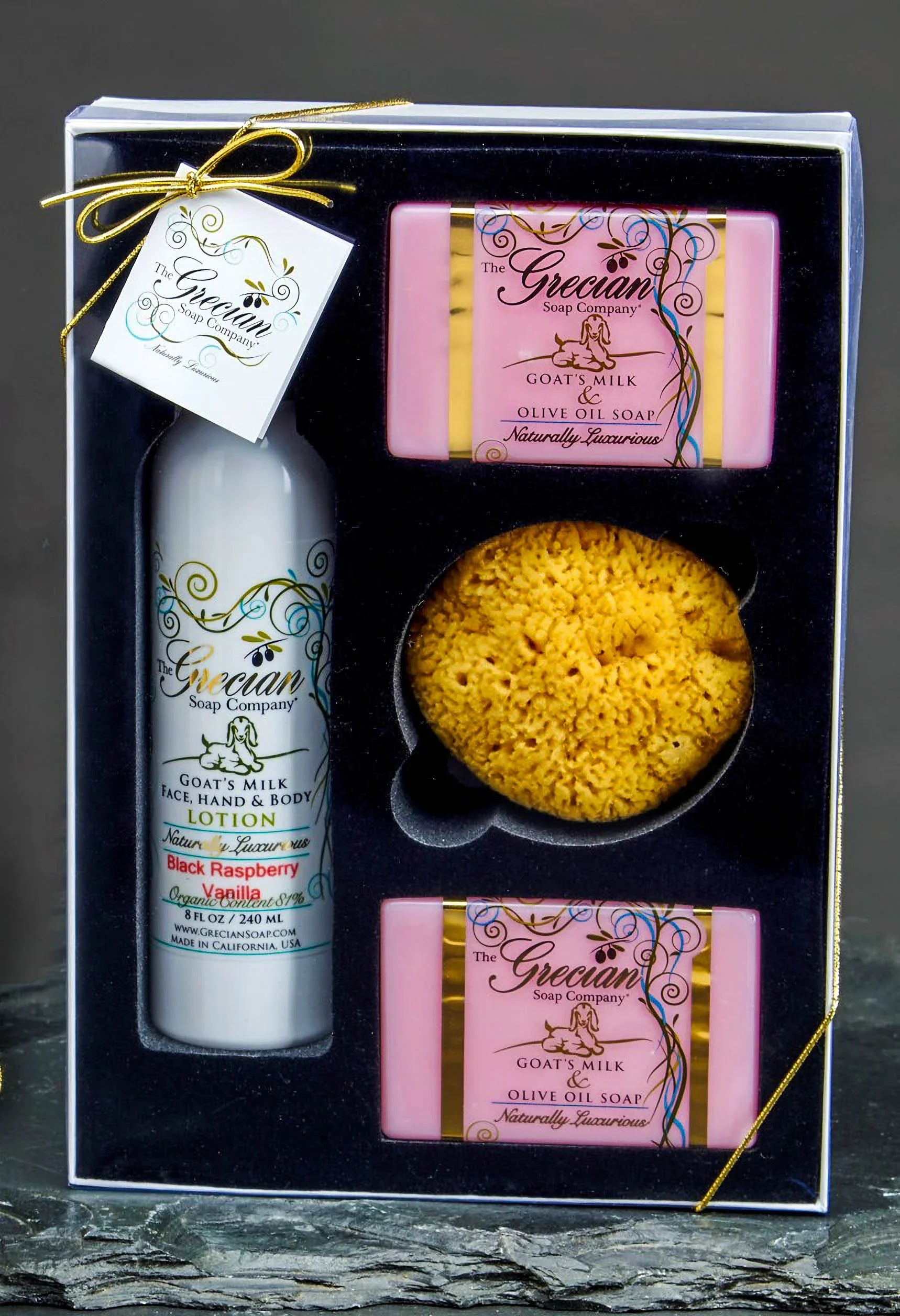 Grecian Soap Company gift set with goat's milk lotion, two olive oil soaps, and natural sponge
