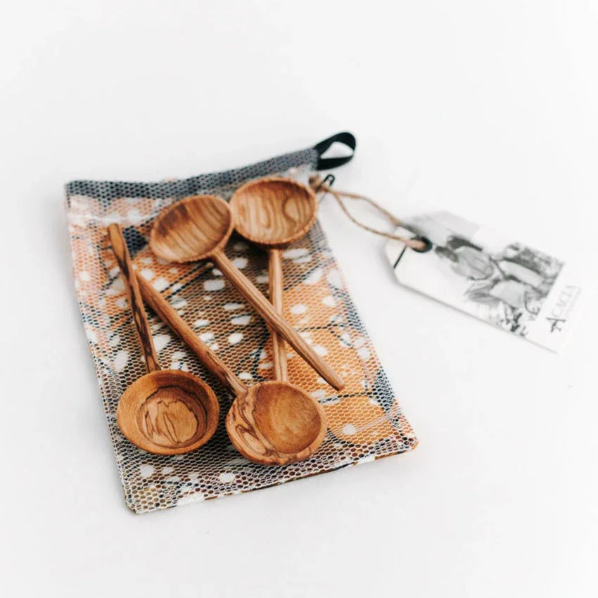 Set of handcrafted wooden spoons on a mesh pouch with gift tag, Qu!rk Boutique gift.