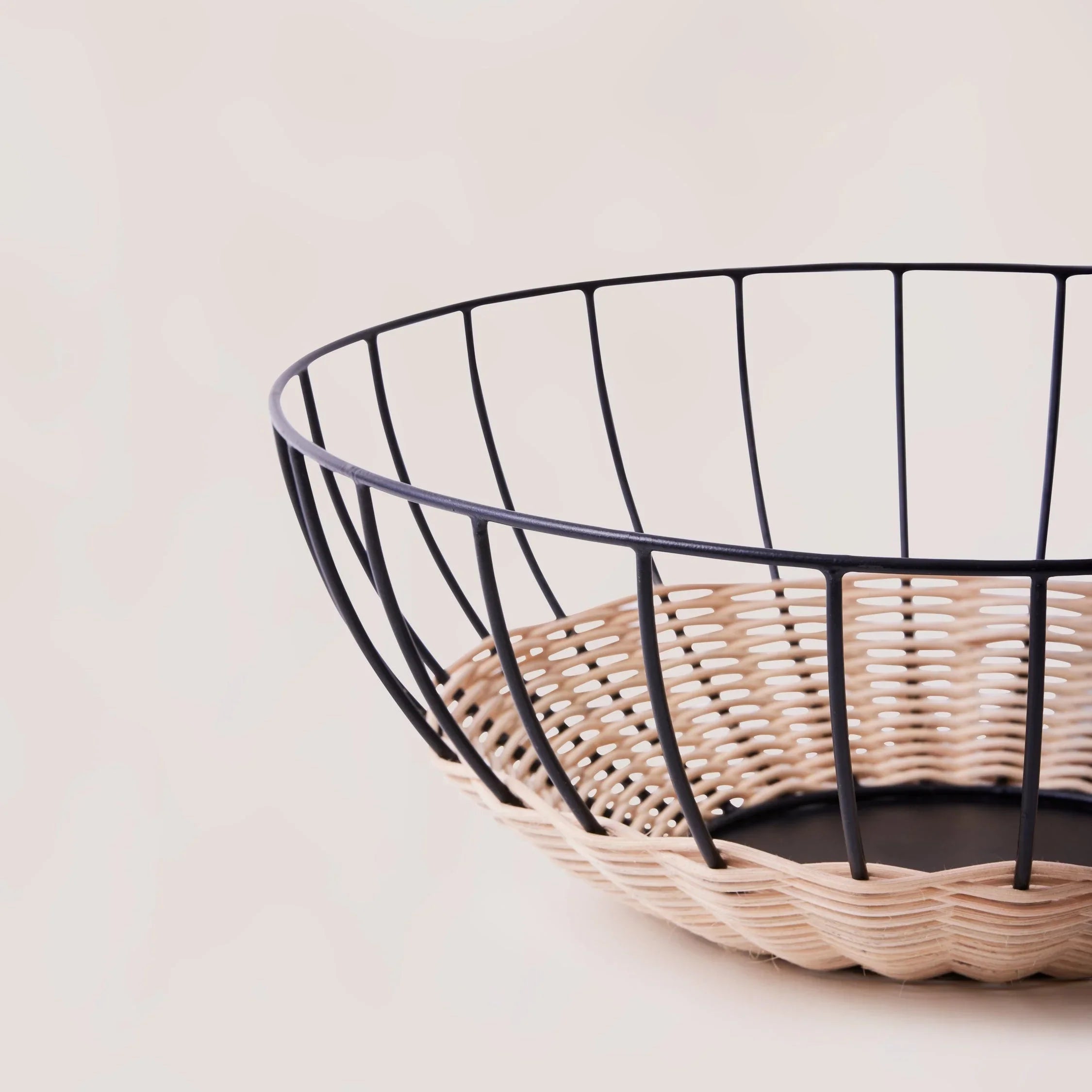 Modern wire and wicker basket on a light background, Qu!rk Boutique sustainable home decor
