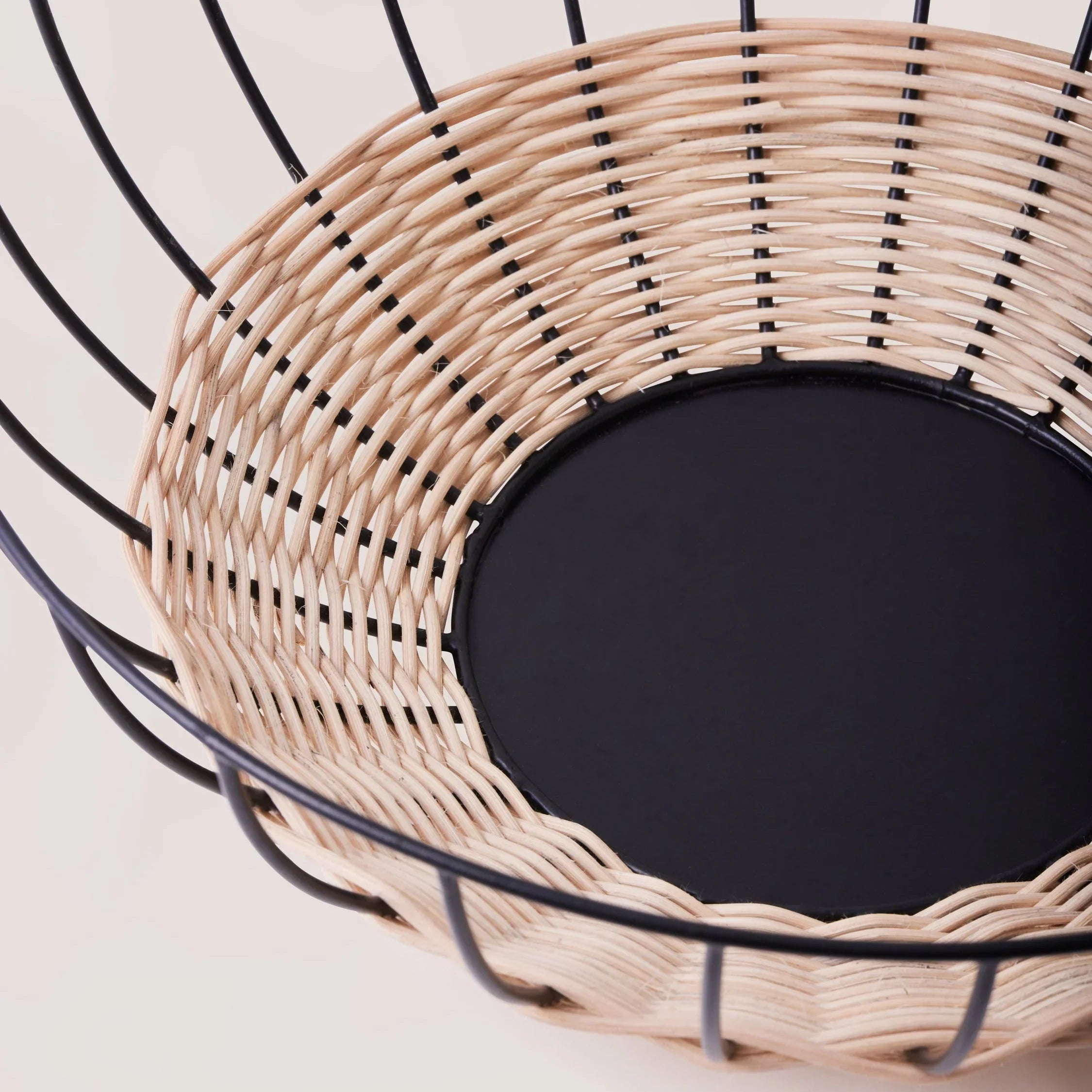 Modern woven rattan and black metal basket, home décor at Qu!rk Boutique