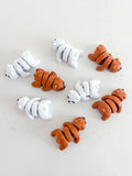 Assorted brown and white baby bear fidget toys on a white background, Qu!rk Boutique