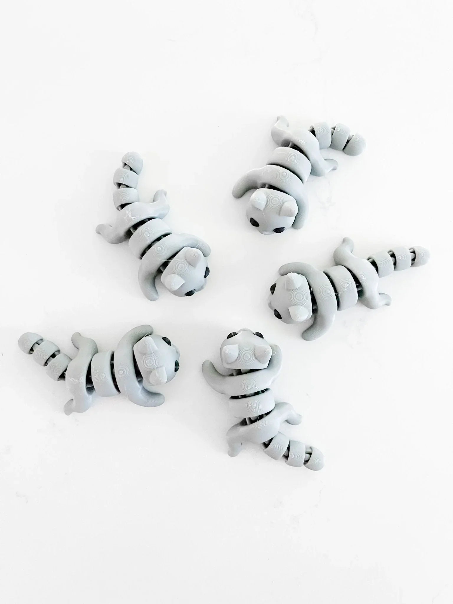 Gray baby cat fidget toys on white background, quirky gifts at Qu!rk Boutique