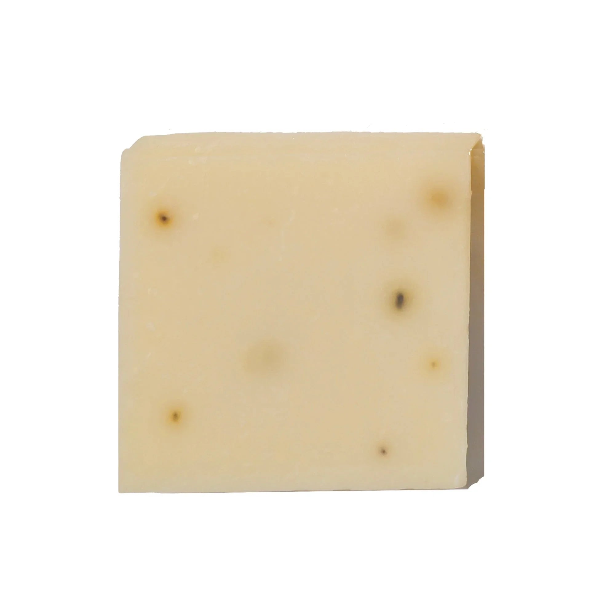 Natural bar soap for face and body with subtle specks, showcased on a white background.