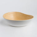 Sustainably crafted bamboo bowl with modern white exterior, featured at Qu!rk Boutique