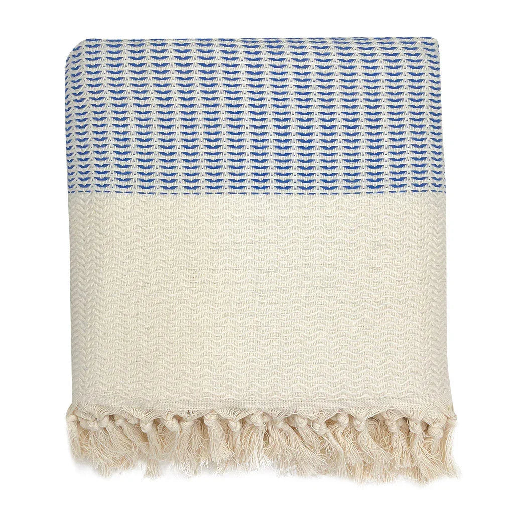 Blue and cream Turkish throw blanket with woven pattern and tasseled fringe, Qu!rk Boutique