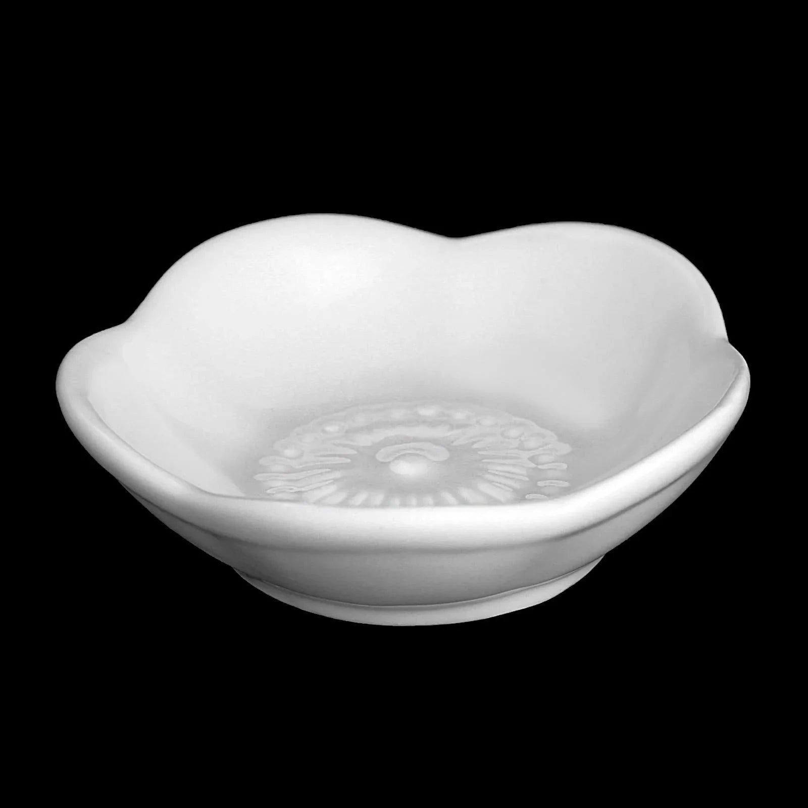 White ceramic bowl with floral embossed base, artisan dish from Qu!rk Boutique
