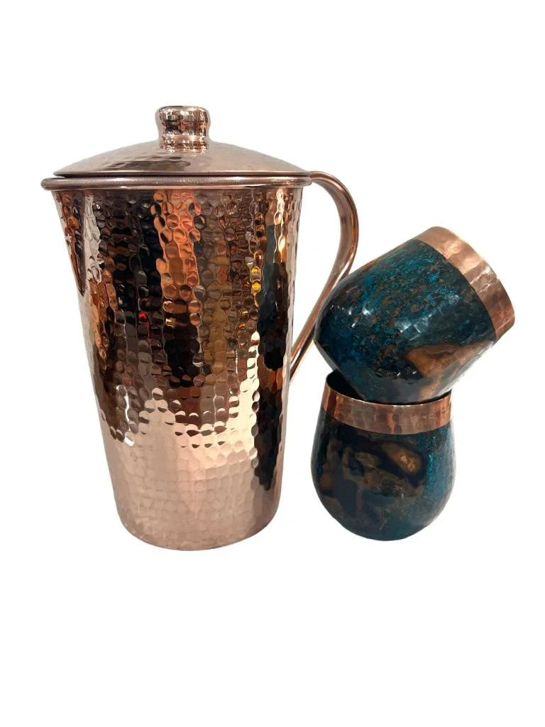 Hammered copper pitcher with lid and two blue-copper tumblers, Qu!rk Boutique giftware