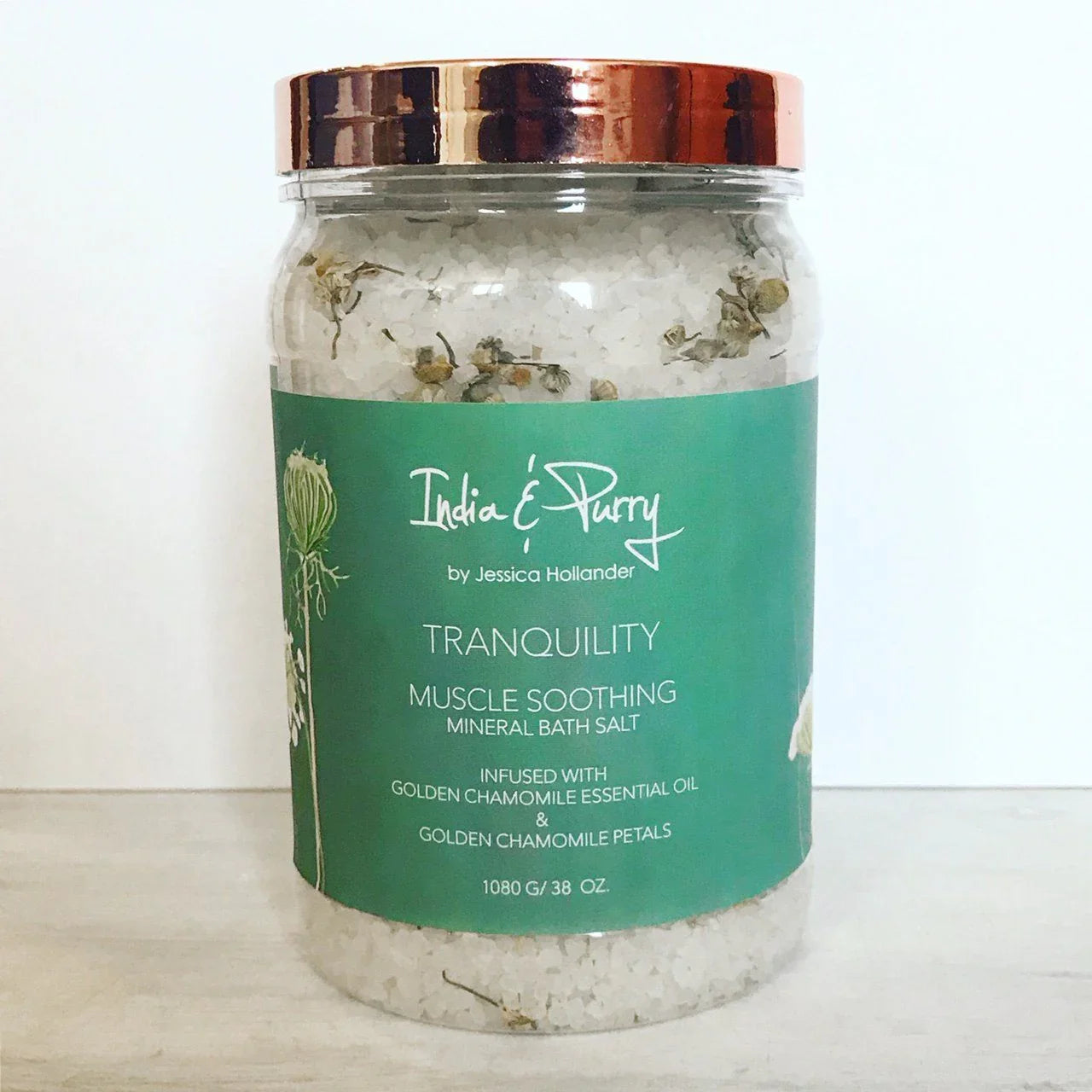India & Purry Tranquility muscle soothing mineral bath salt with chamomile petals in clear jar
