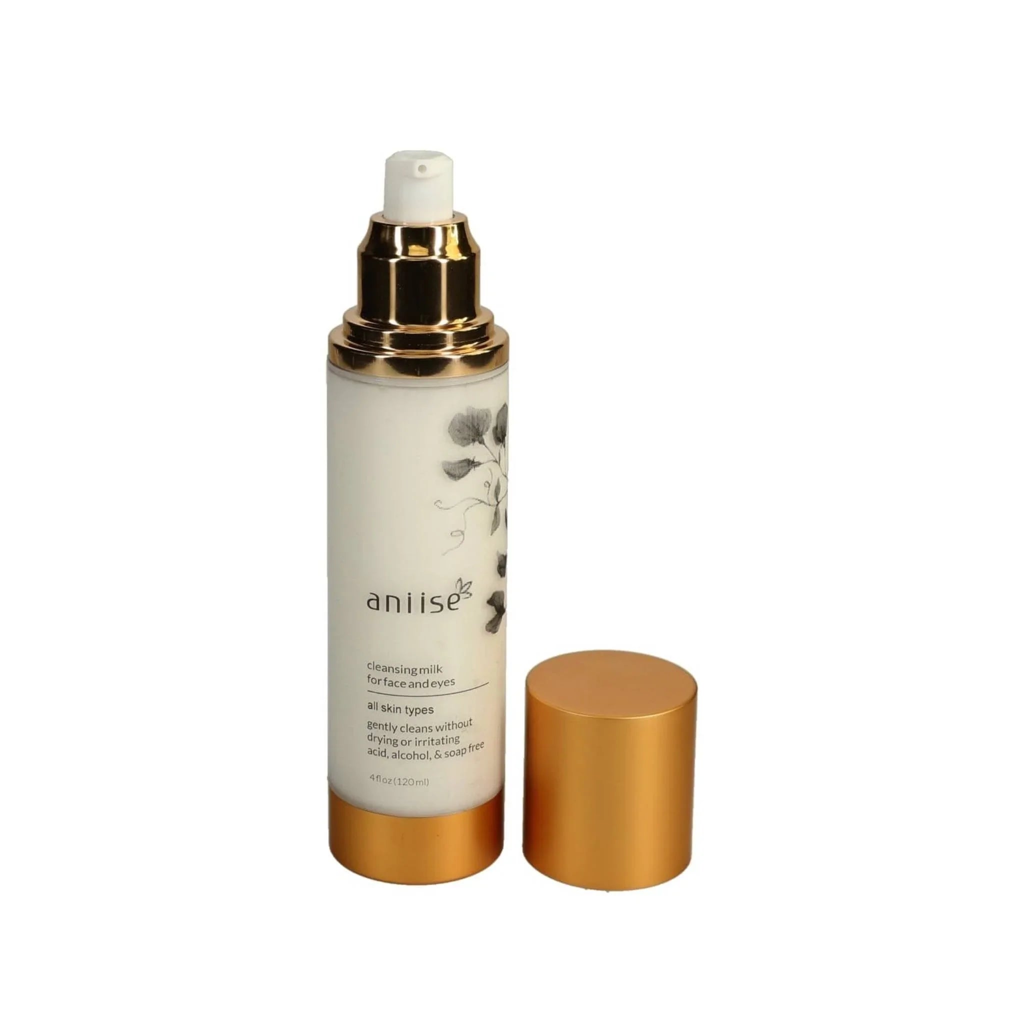 Aniise cleansing milk bottle with gold cap, skincare product for face and eyes at Qu!rk Boutique