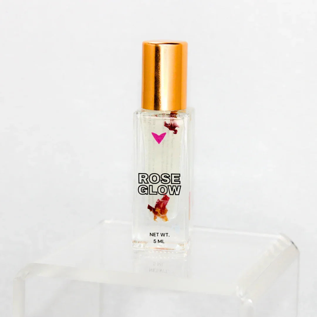 Rose Glow perfume oil with gold cap and rose petals, Qu!rk Boutique gift, 5ml bottle