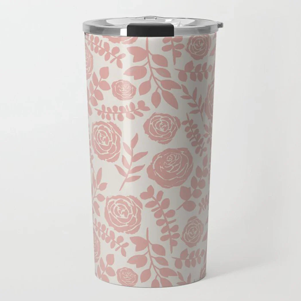 White stainless steel tumbler with pink floral and leaf pattern and silver lid