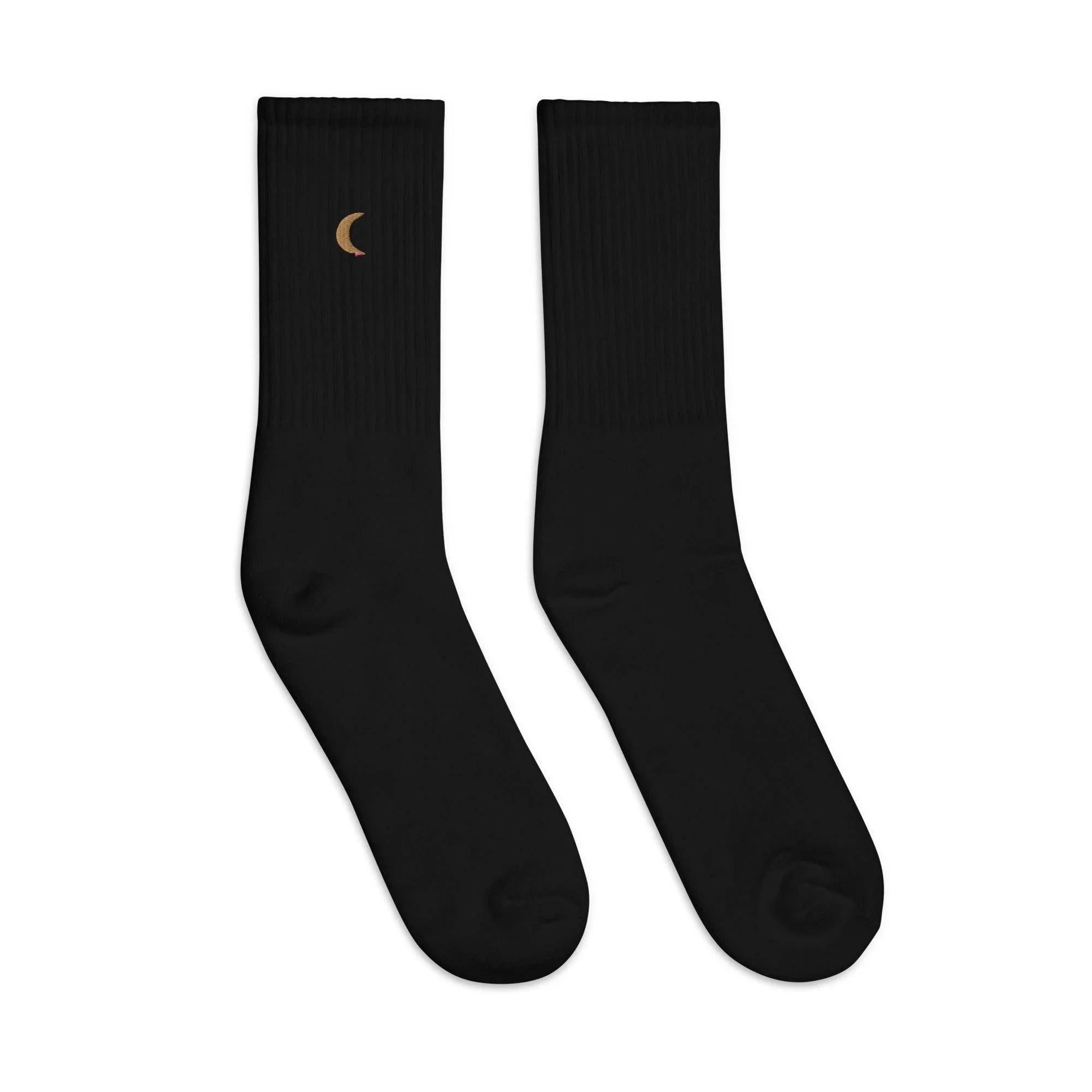 Pair of black embroidered crew socks with a small golden crescent moon design