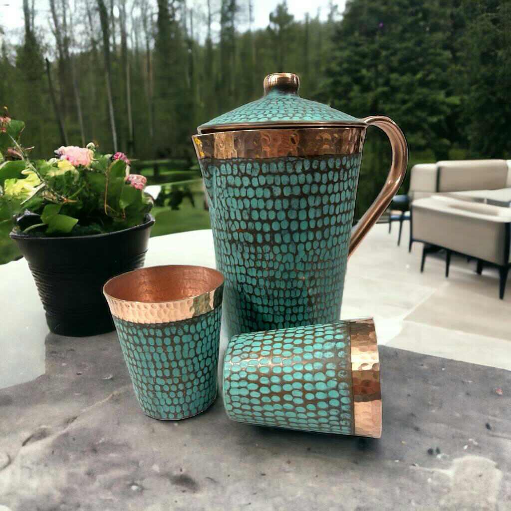 Turquoise and copper pitcher set with two cups on outdoor table, Qu!rk Boutique garden style
