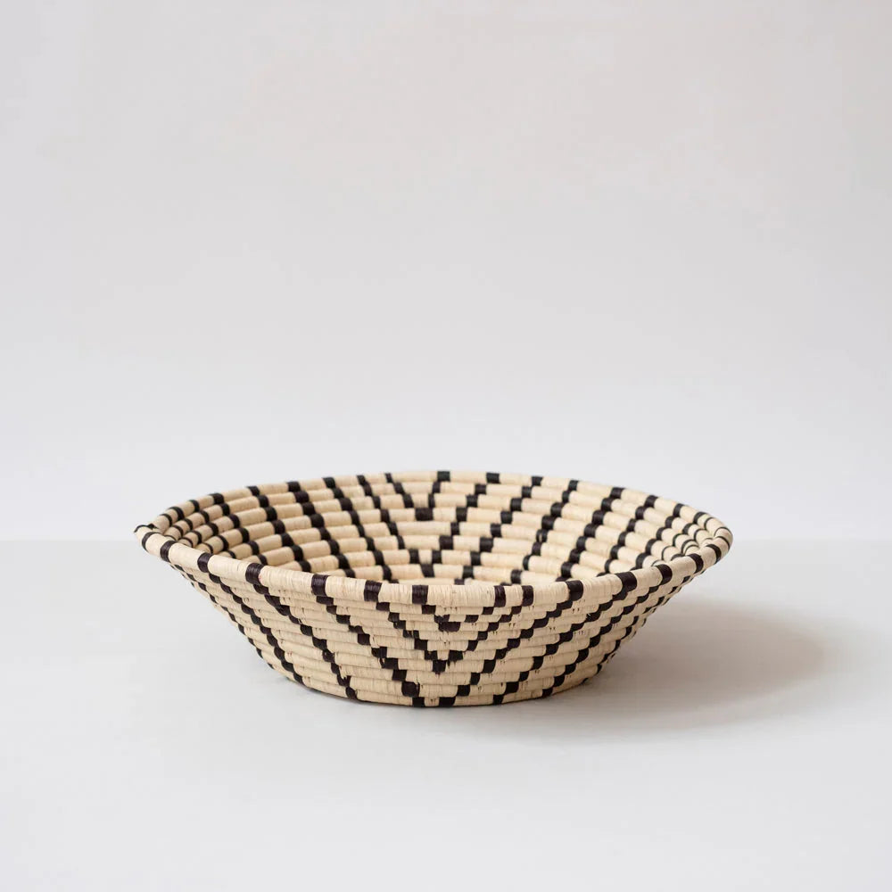 Handwoven decorative basket with black and natural geometric pattern, Qu!rk Boutique gift