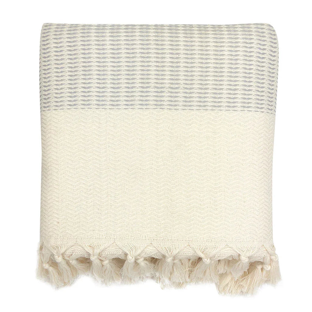 Fair trade cotton throw blanket with cream zigzag pattern and fringe, Qu!rk Boutique