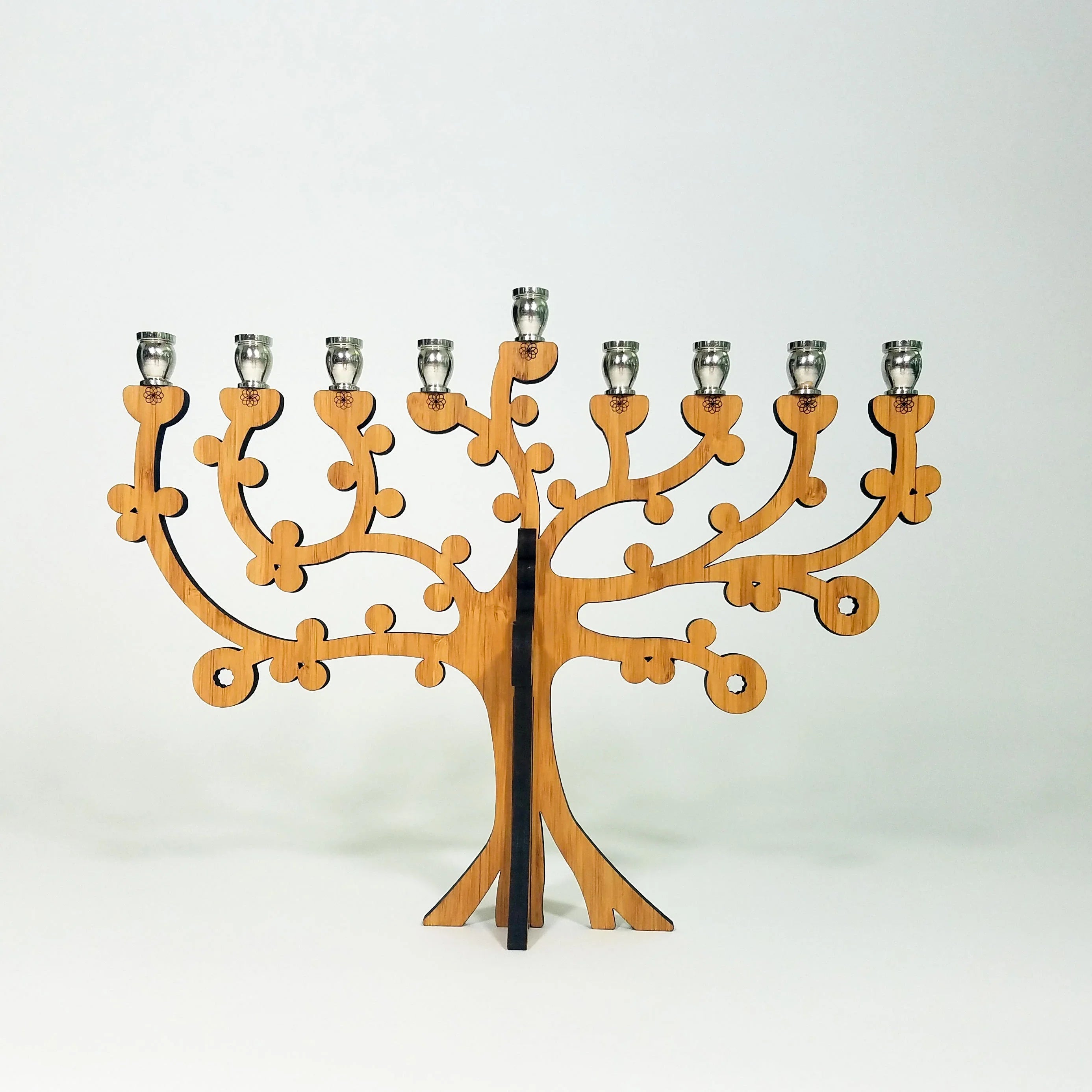 Wooden menorah shaped like a tree with silver candle holders, minimalist JIudaica design