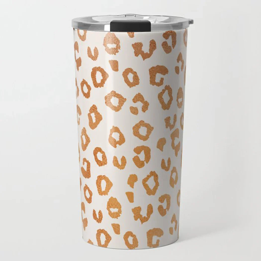 White insulated tumbler with metallic lid and rose gold leopard print pattern