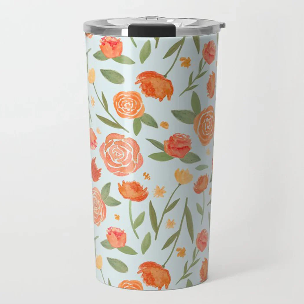 tall tumbler with silver lid featuring orange and yellow watercolor floral pattern on light blue background