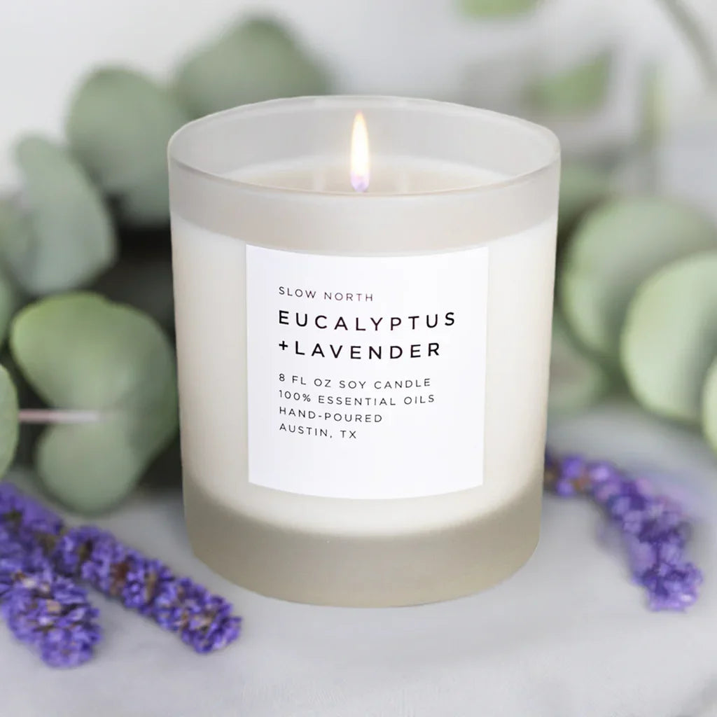 Eucalyptus lavender soy candle in frosted glass with botanical accents, Qu!rk Boutique