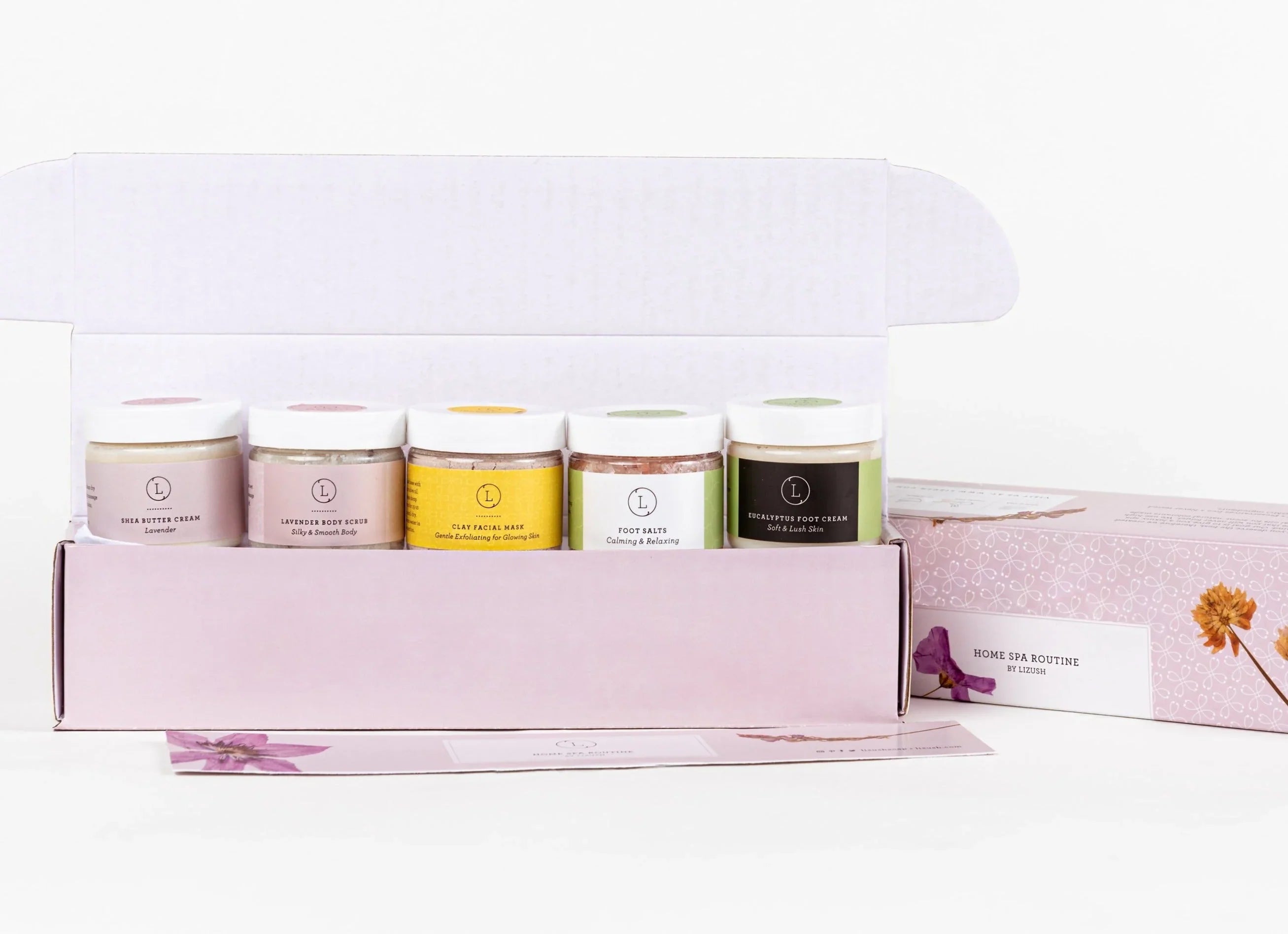 Home spa routine kit with shea butter cream, lavender scrub, clay mask, foot salts, eucalyptus foot cream