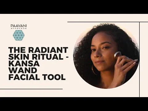 Woman using a Kansa wand facial tool for radiant skin, Paavani Ayurveda skincare product