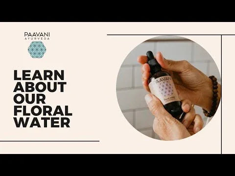 Hands holding Paavani Ayurveda floral water bottle, boutique skincare product, eco-conscious gifting