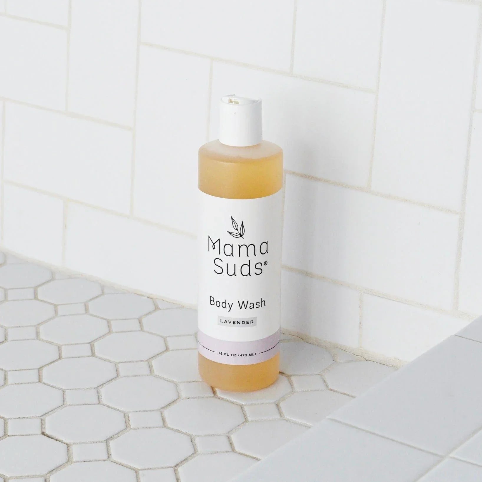 Mama Suds lavender body wash on white tile, eco-friendly skincare at Qu!rk Boutique
